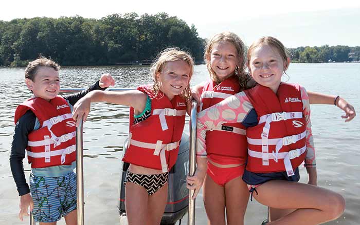 Group of children in life jackets