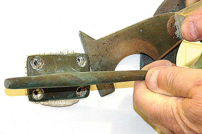 Pry fitting off with putty knife