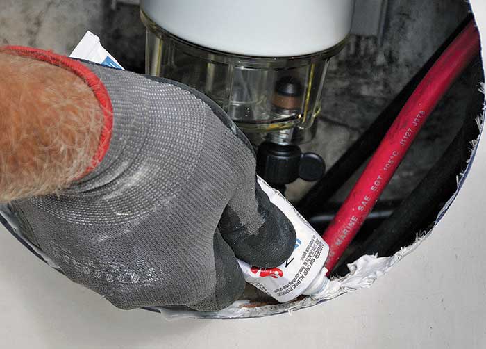 Seal edges of access hole