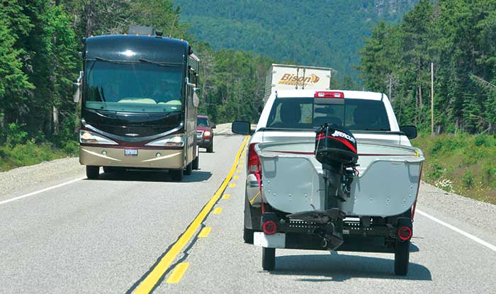 Towing a boat along the highway